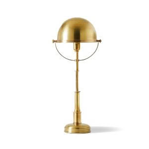 Golden globe on a brass stand isolated on white