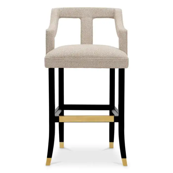 Modern black and beige armchair with gold accents