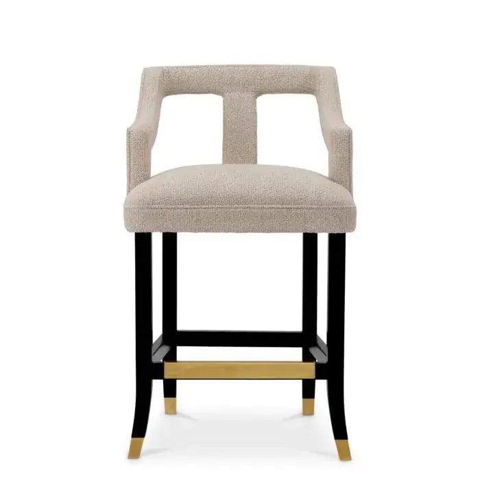 Elegant beige chair with black and gold frame