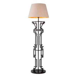 Tall black floor lamp with geometric design and beige shade