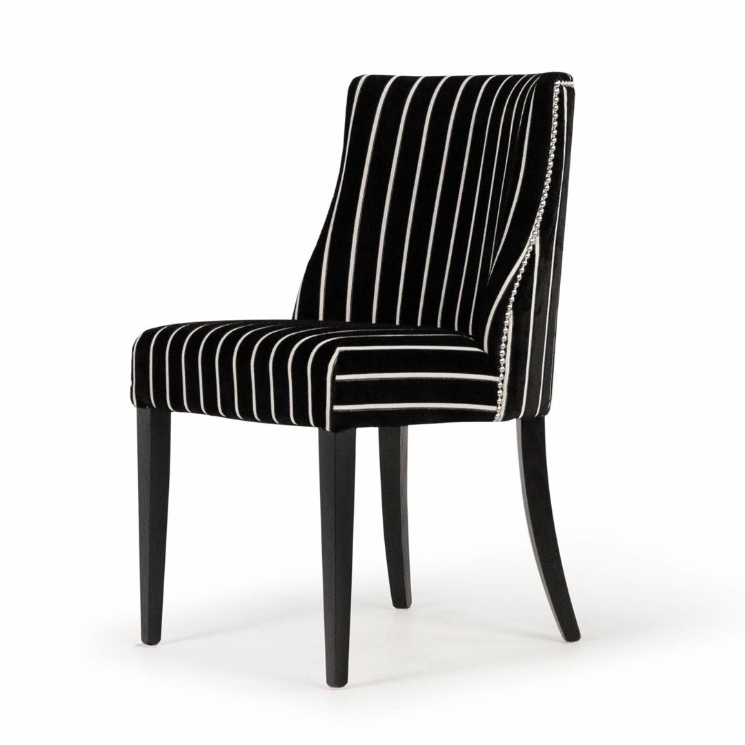 Black striped velvet chair on white background