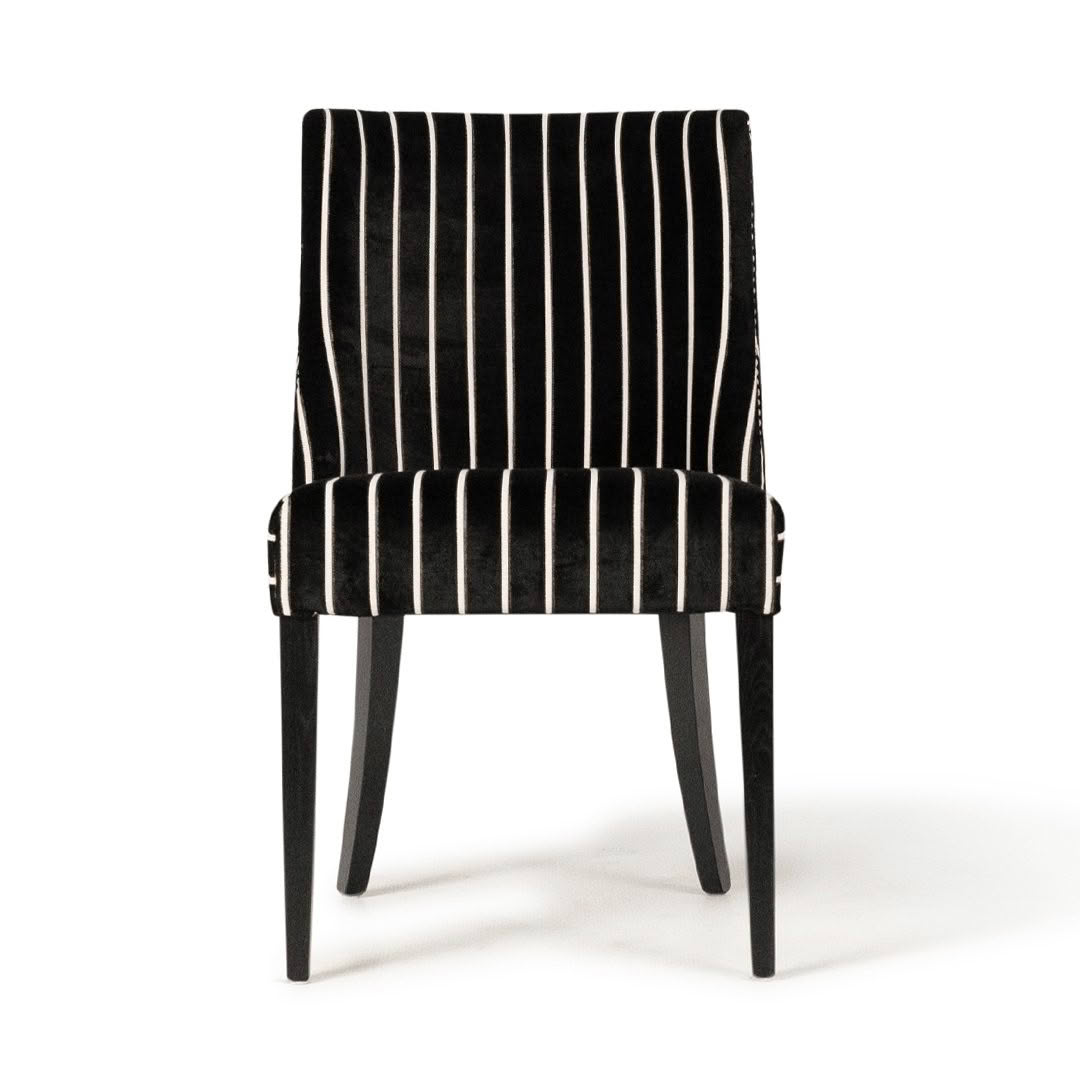 Elegant black striped velvet chair on white background
