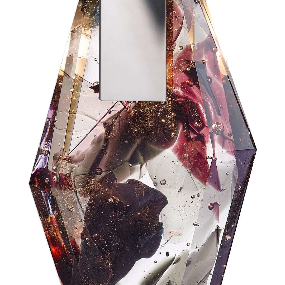 Abstract crystalline sculpture with embedded organic material