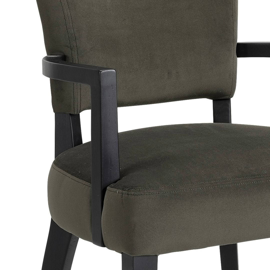 Olive green upholstered chair with black frame