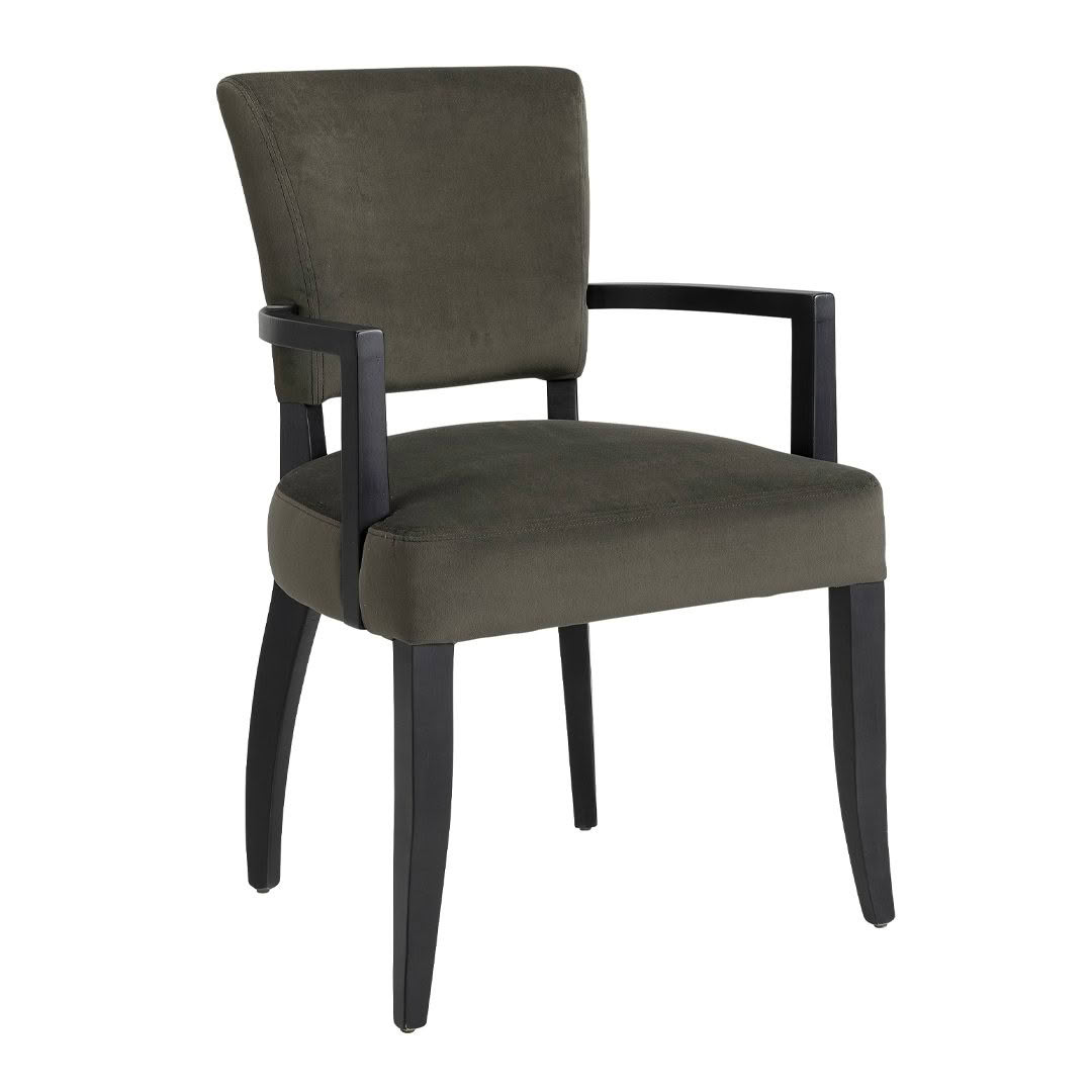 Dark green upholstered armchair with black legs