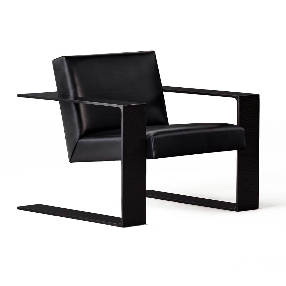 Modern black leather chair with metal frame