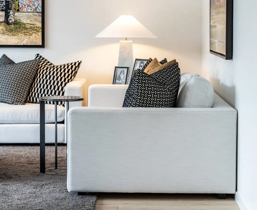 Stylish living room with patterned pillows and modern decor