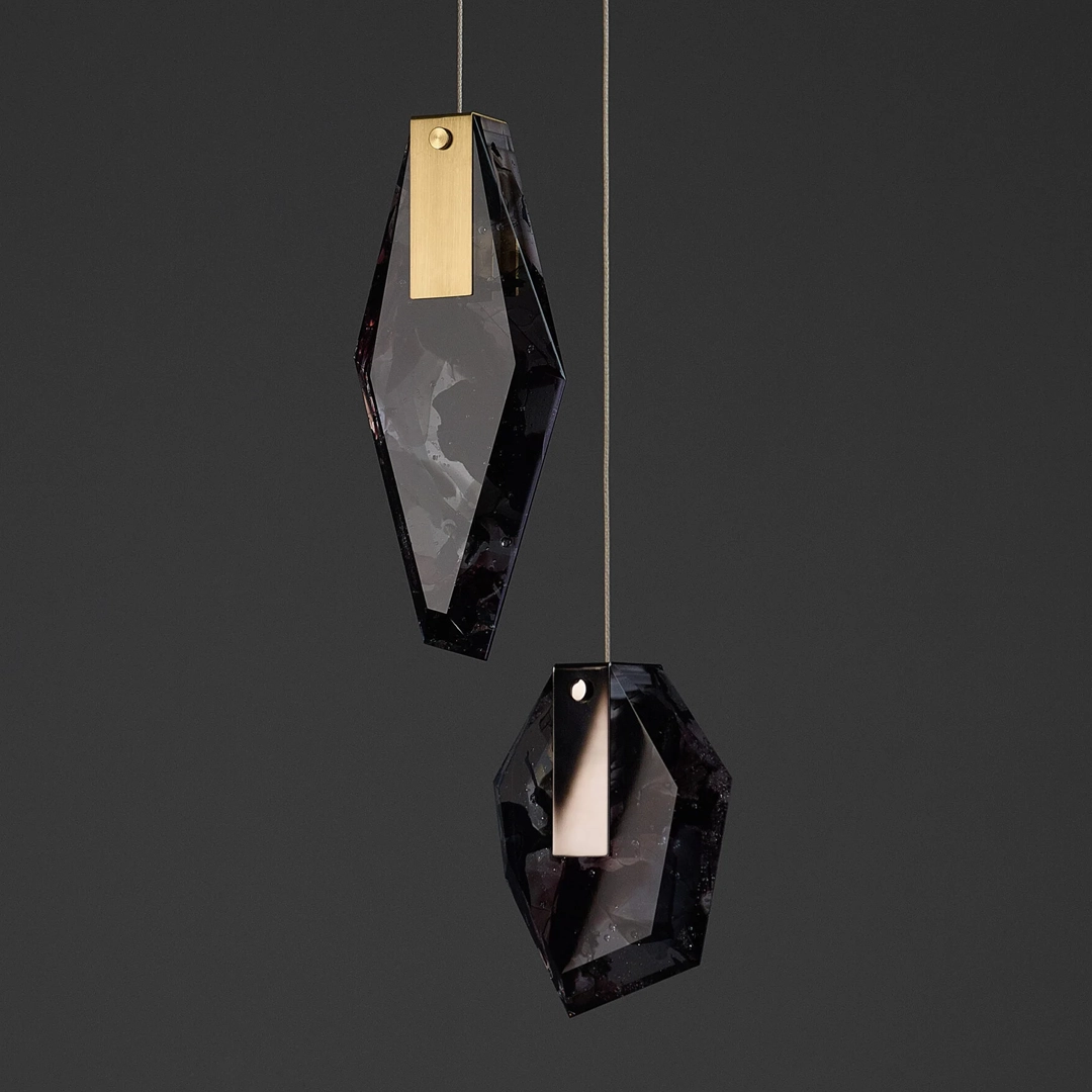 Modern black geometric pendant lights on dark background