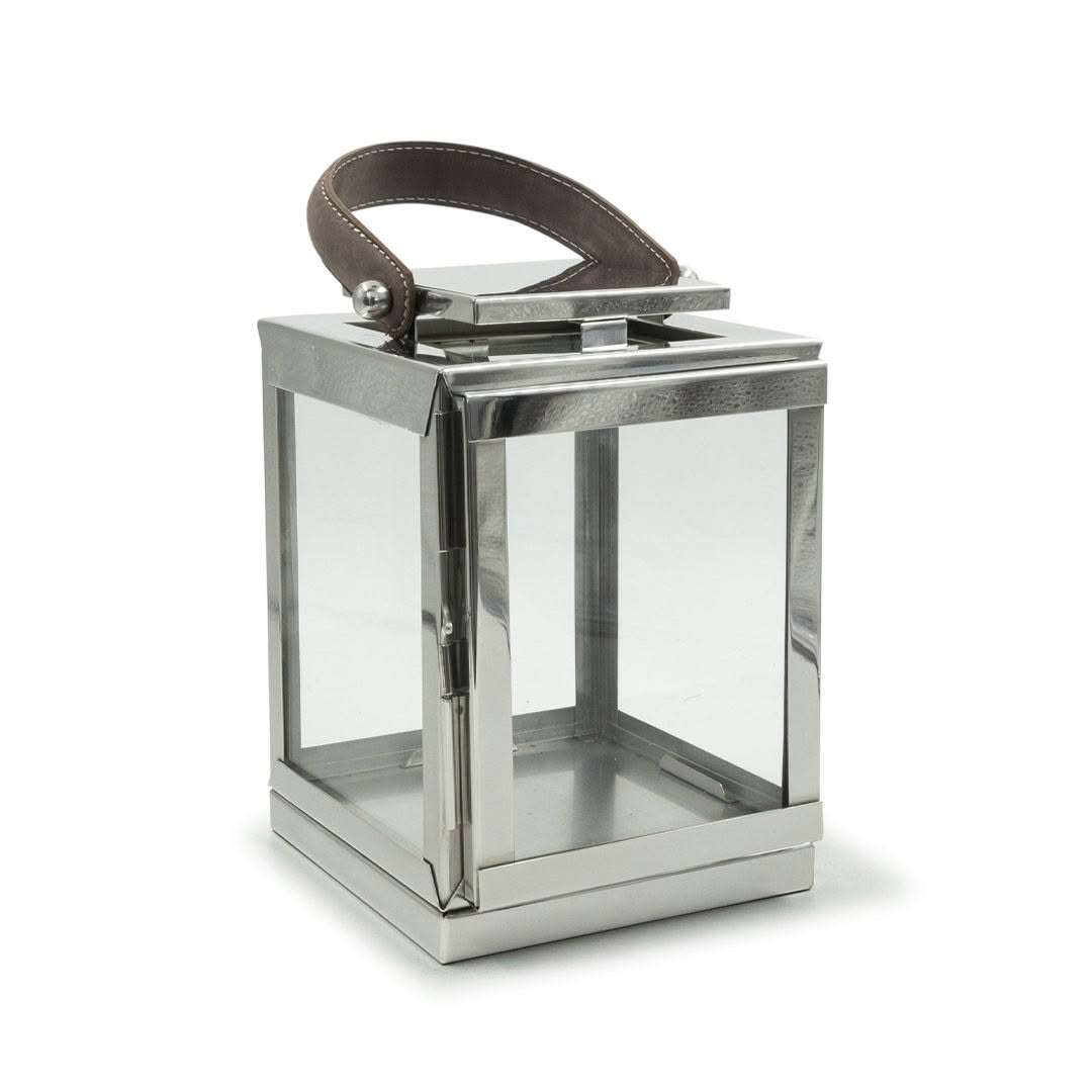 Silver lantern with leather handle isolated on white