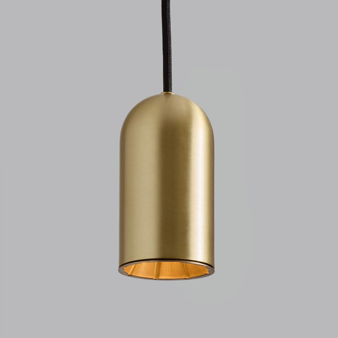 Golden pendant light with orange interior
