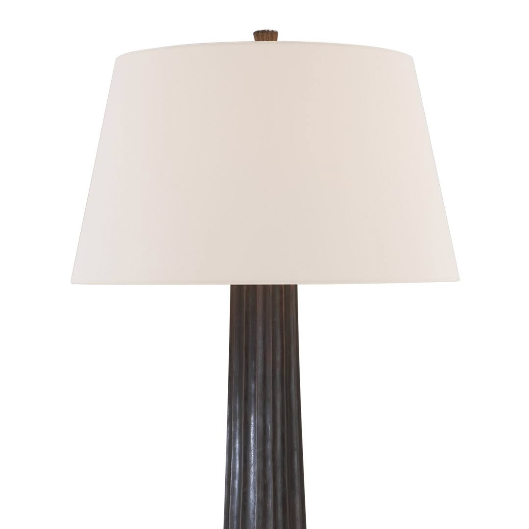 Elegant table lamp with large beige shade and dark base