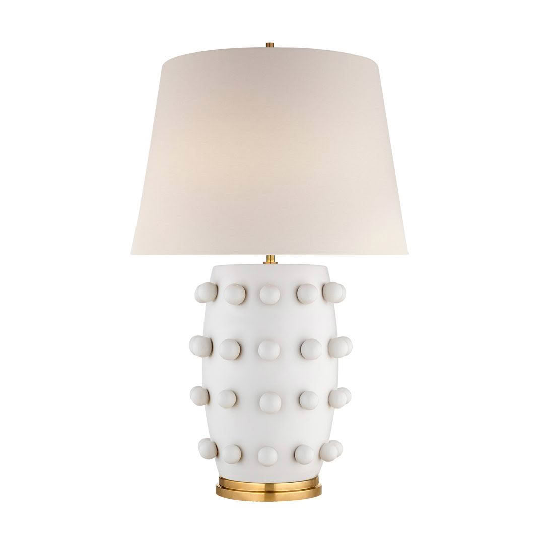 White ceramic lamp with spherical accents and gold base