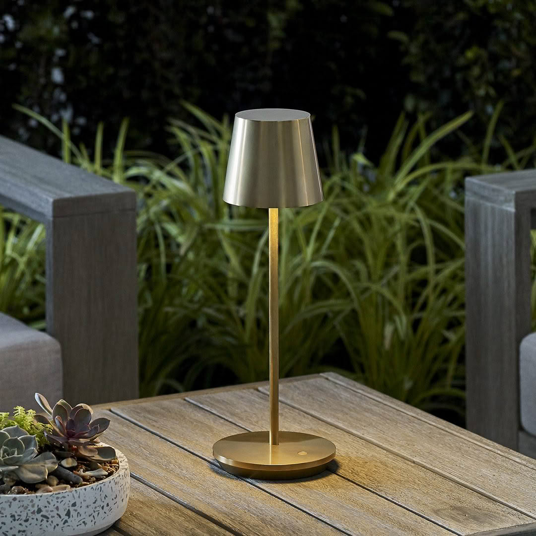 Modern lamp on outdoor table at night