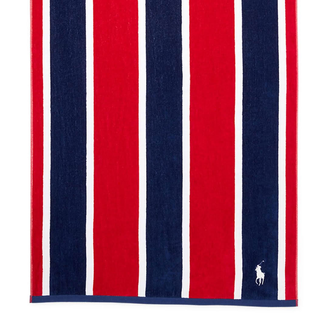 Red and navy striped towel with small logo