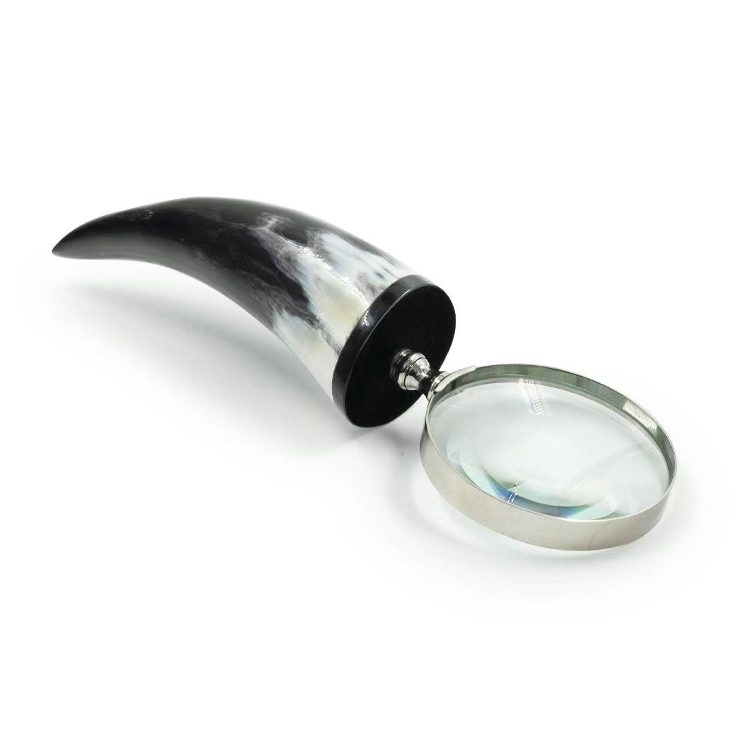 Magnifying glass with elegant horn handle isolated on white