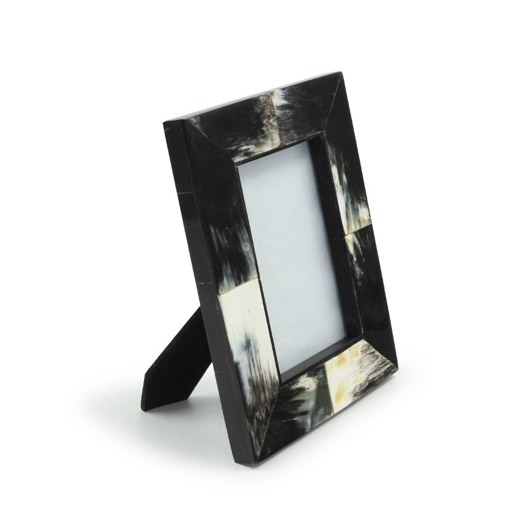 Black and white marbled photo frame isolated on white