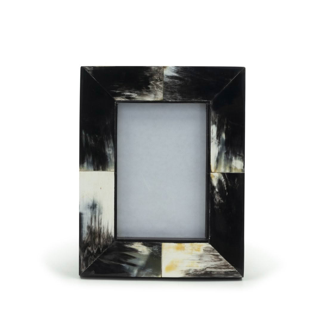Black and white marbled picture frame isolated.
