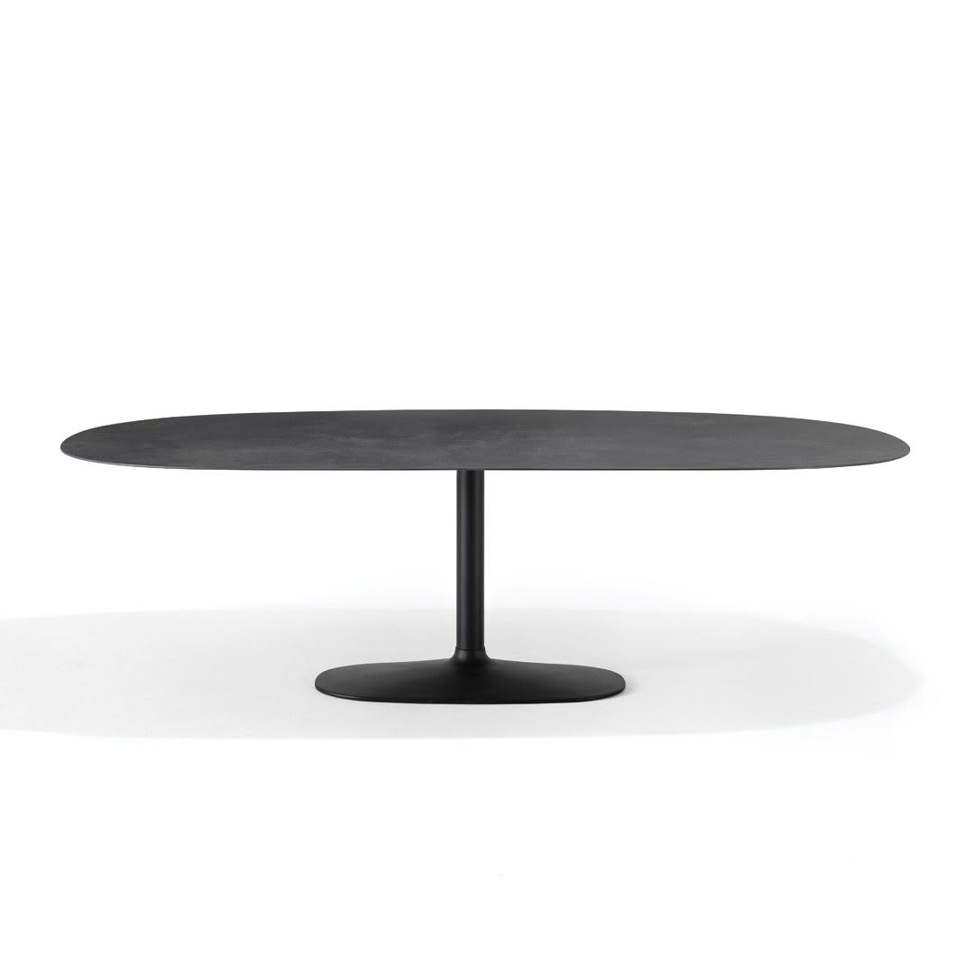 Minimalist black oval table on white background