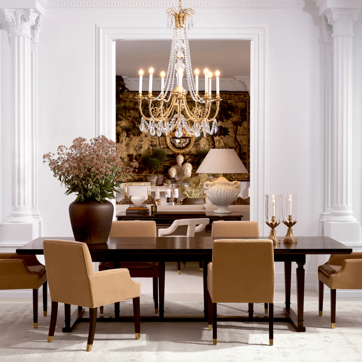 Elegant dining room with chandelier and classical decor