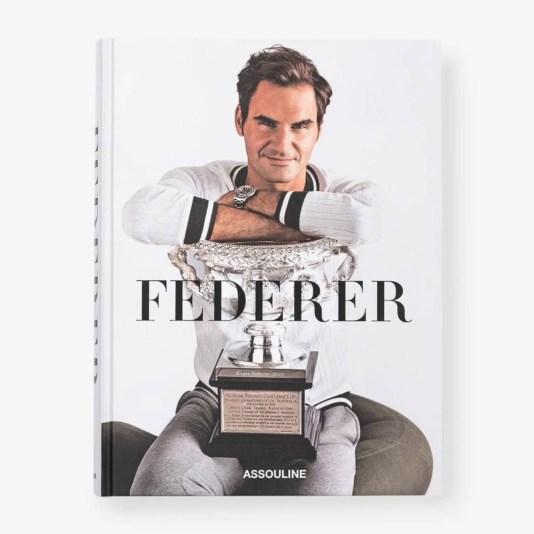 Federer_Classic_book_2 Book cover featuring man holding trophy