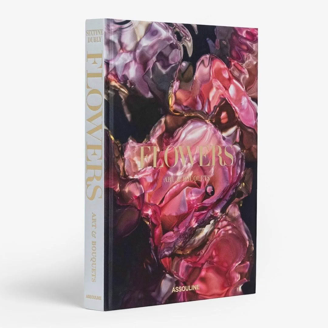 Book titled 'Flowers; Art & Bouquets' with floral cover