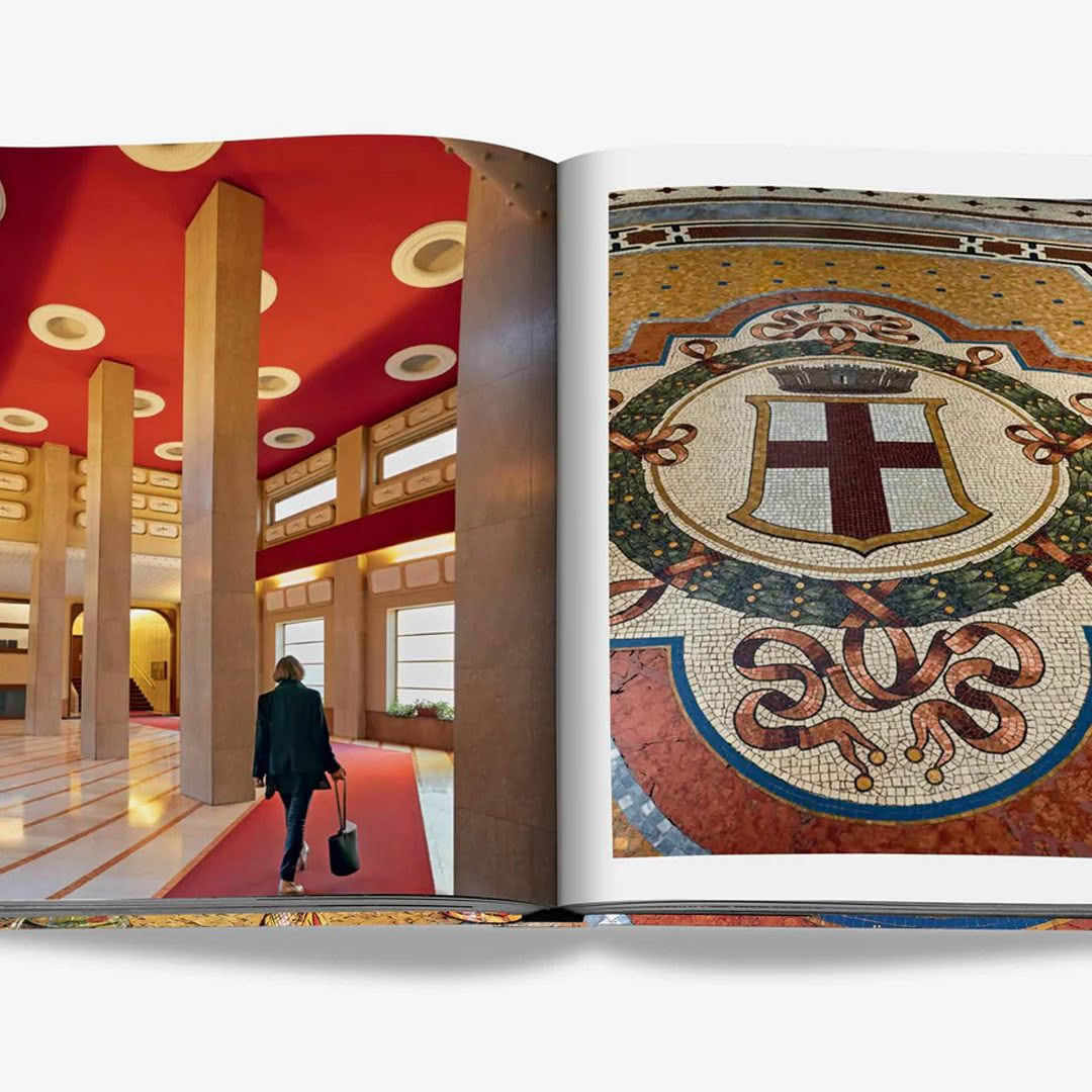 Open book showing woman in red hallway and mosaic