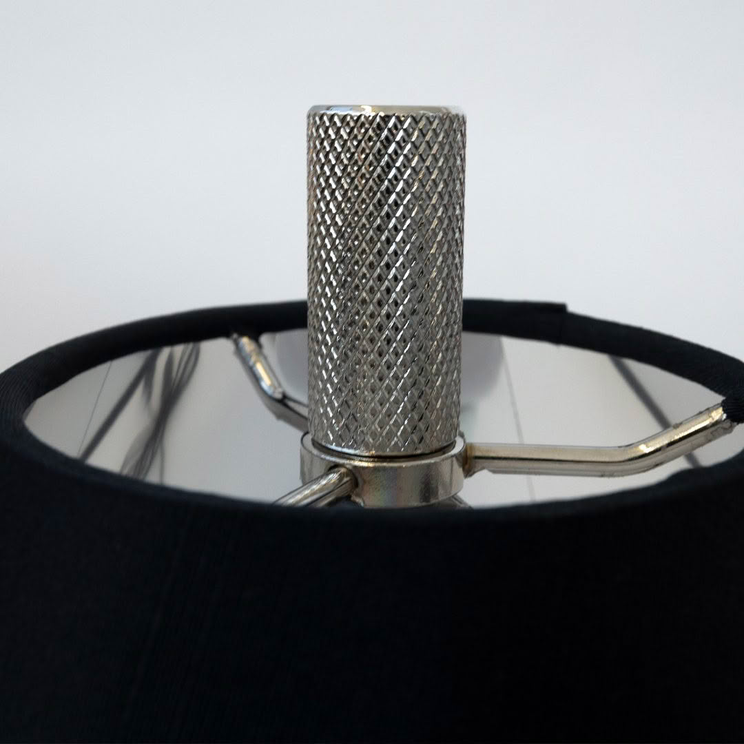 Close-up of microphone with metallic texture on stand