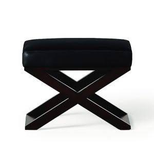 Modern black leather X-frame ottoman on white background