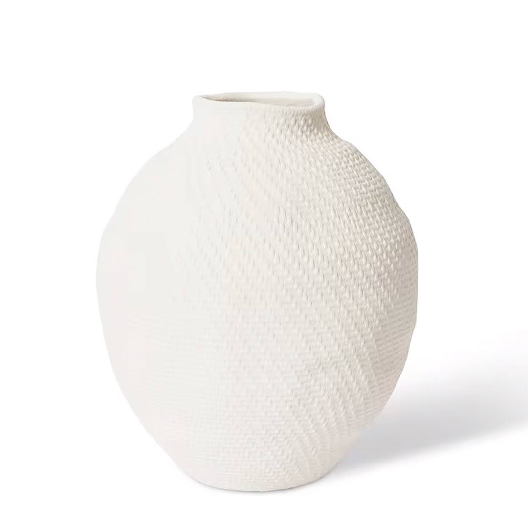 White textured ceramic vase isolated on white