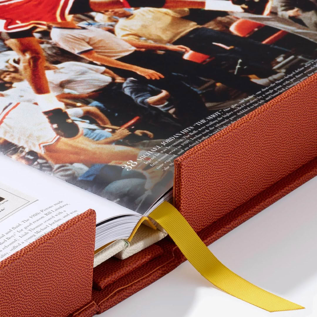 Basketball-The-Impossible-Collection Open hardcover book with photo on sports fans