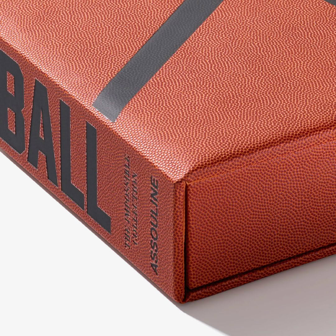 Basketball-The-Impossible-Collection_2 Close-up of textured book spine with 'FOOTBALL' print