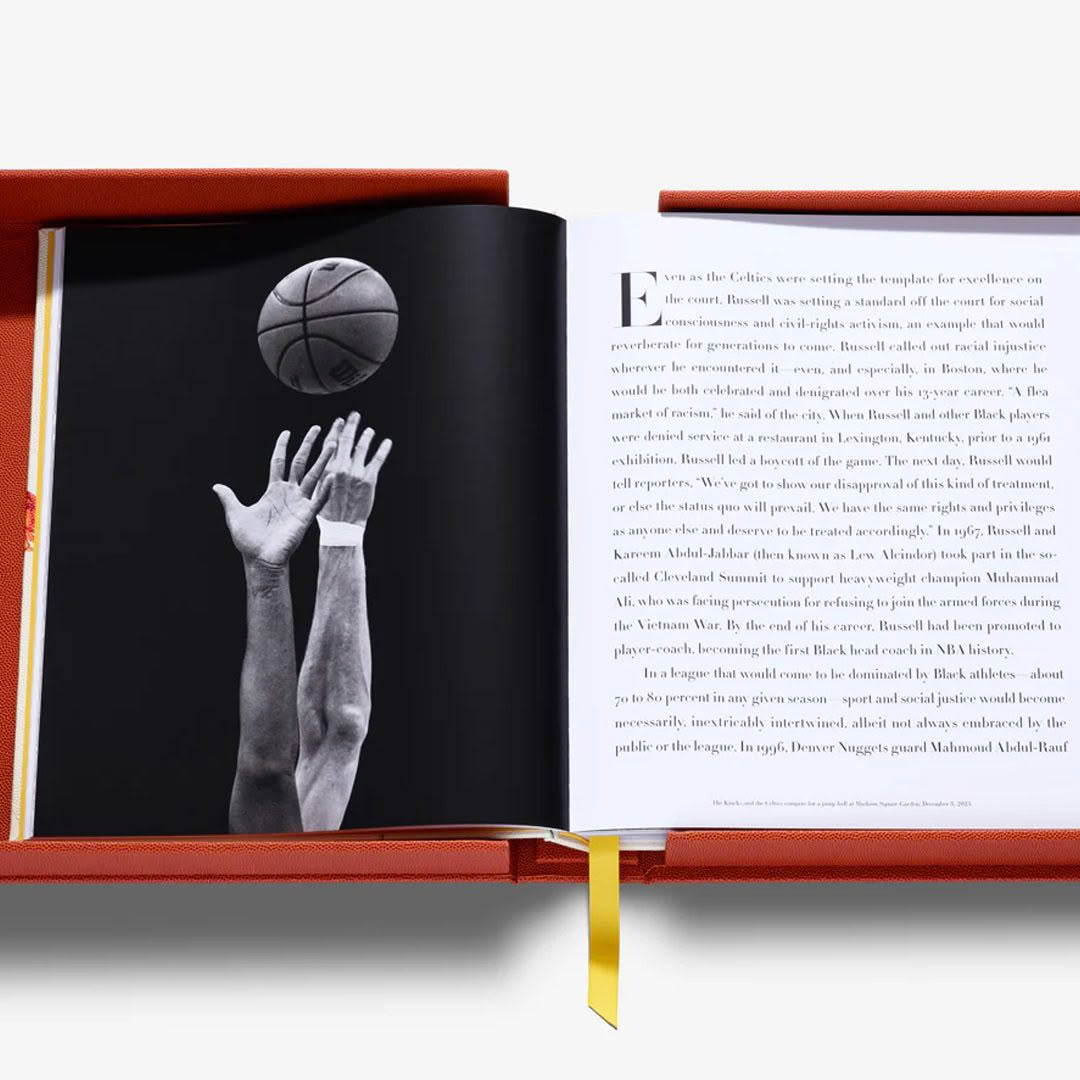 Basketball-The-Impossible-Collection_3 Open book showing photo of hands reaching for basketball