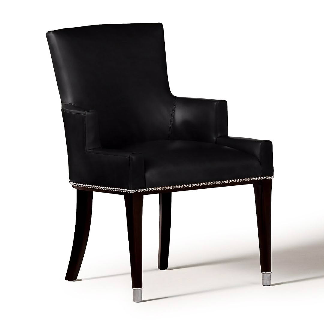 Elegant black leather chair with nailhead trim
