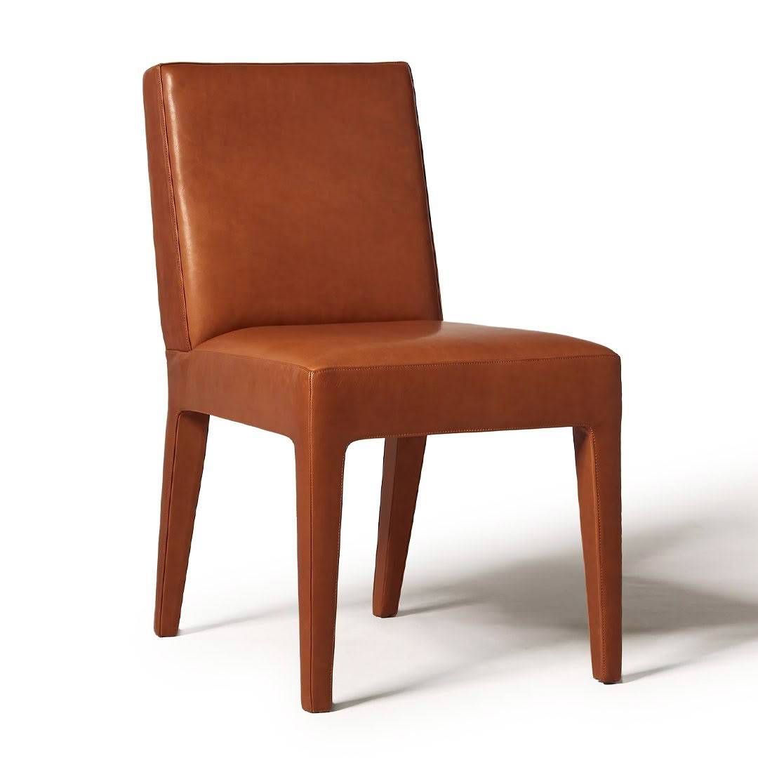 Brown leather dining chair on white background