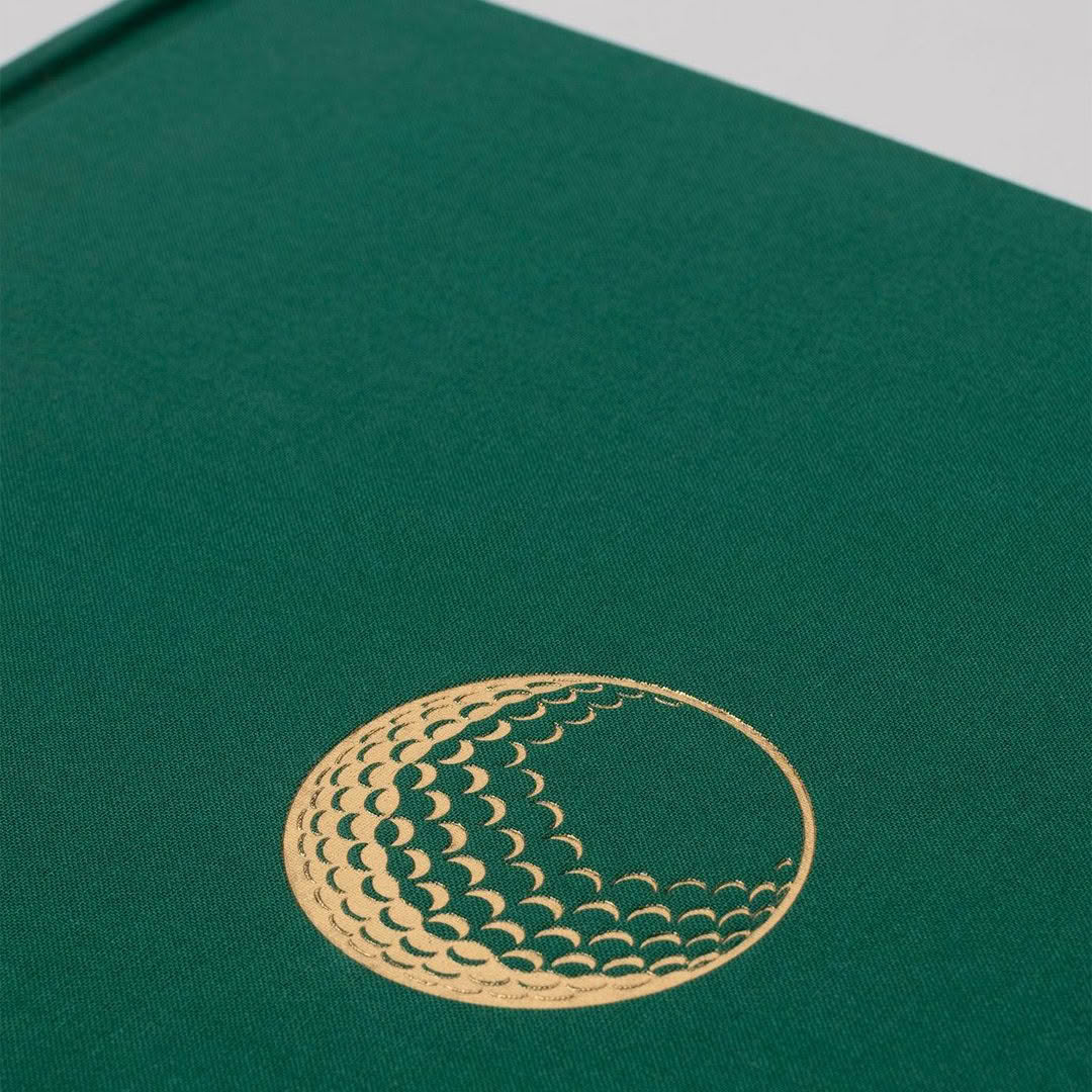 Green book cover with gold circular wave design