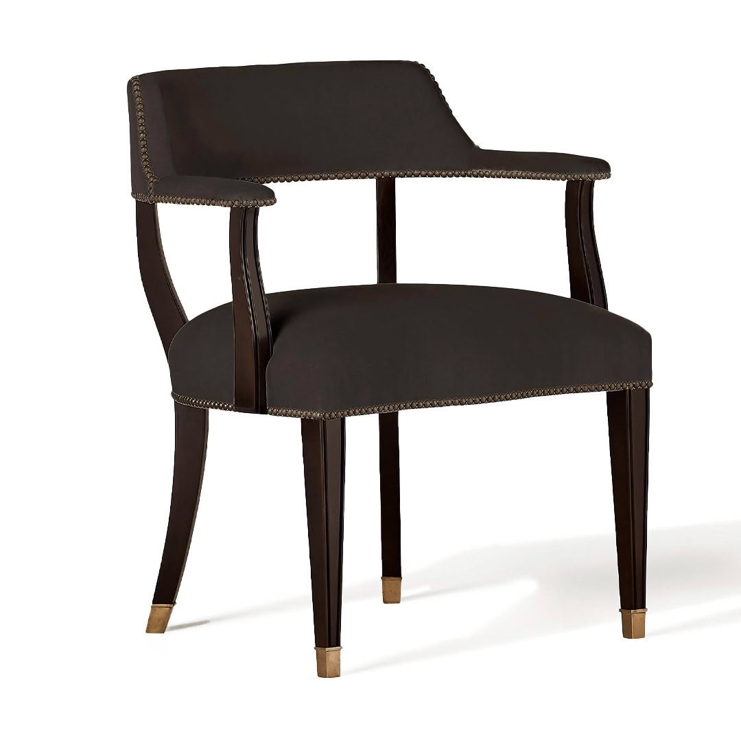 Elegant dark brown upholstered armchair with brass detailing