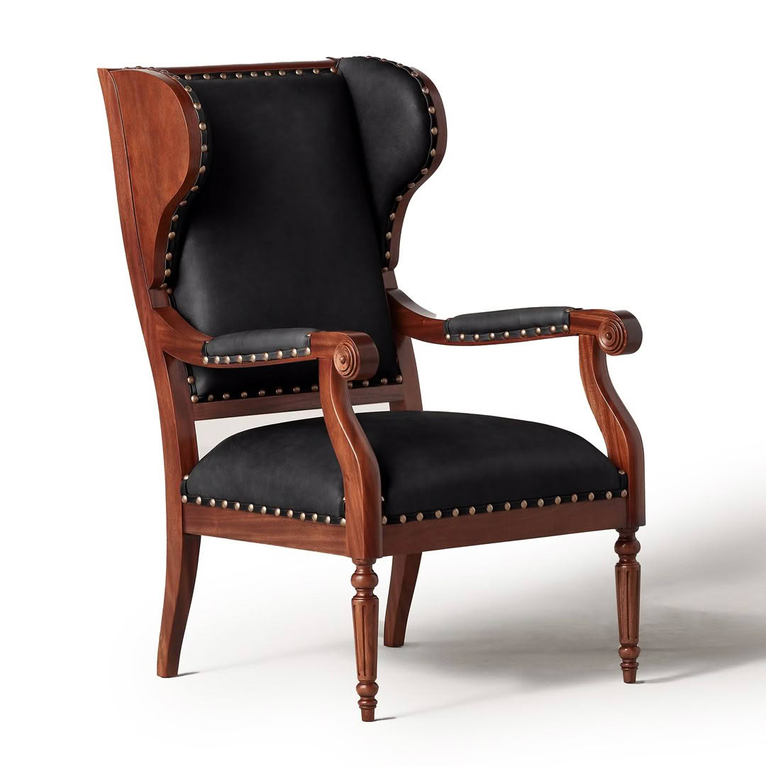Elegant antique wooden armchair with black upholstery