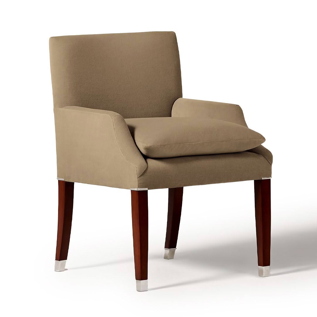 Beige upholstered armchair with wooden legs