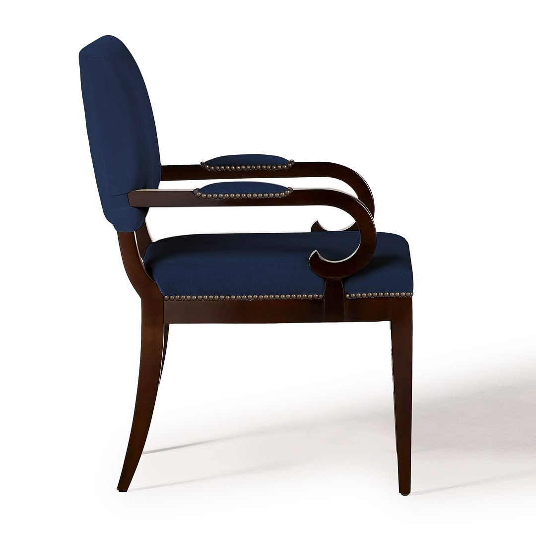 Elegant blue upholstered chair with wooden arms