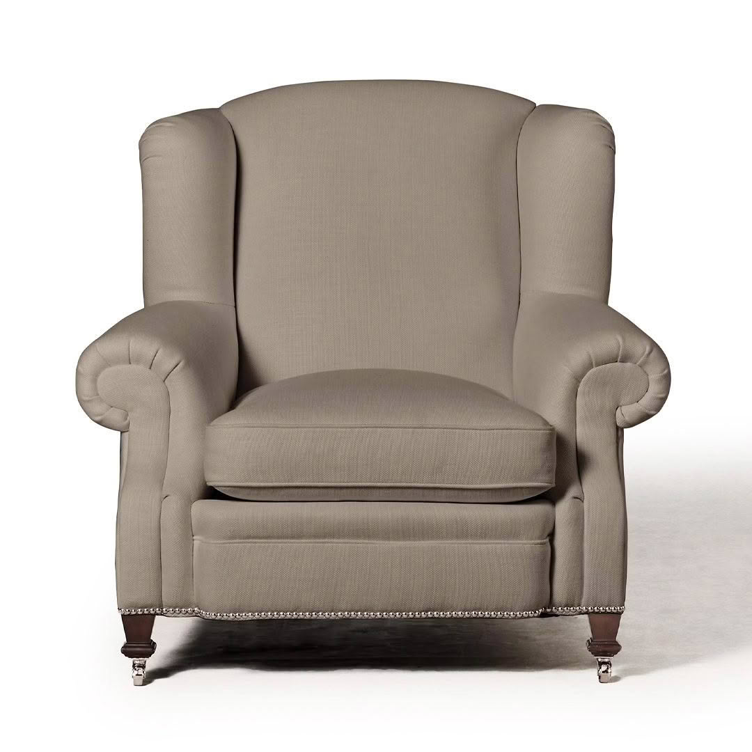 Elegant beige upholstered wingback chair with wooden legs