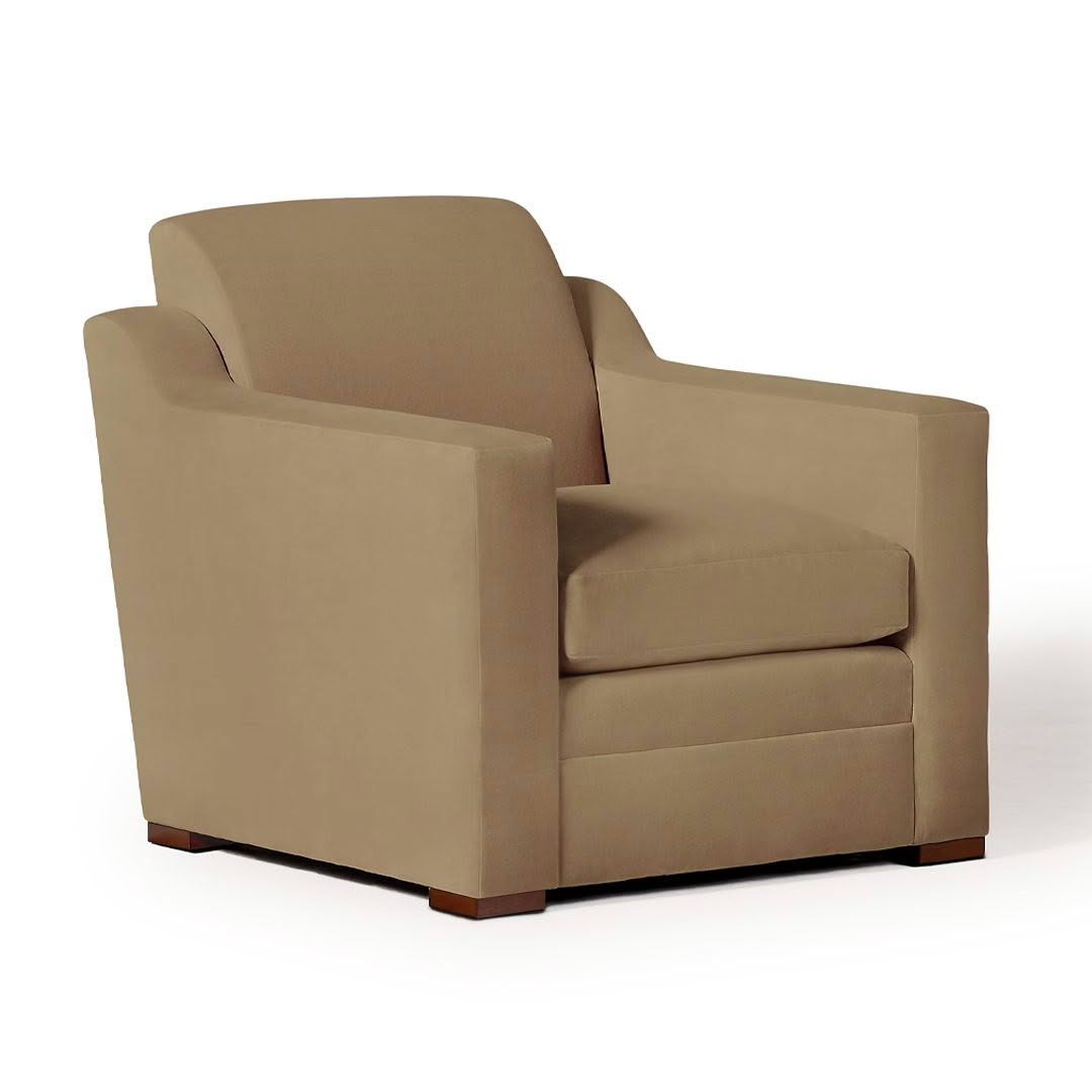Beige upholstered armchair on white background
