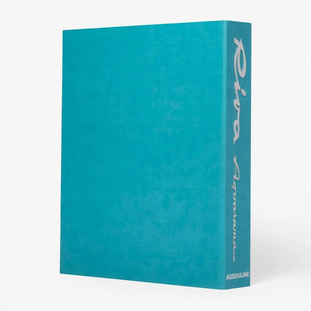 Turquoise Assouline book cover on white background