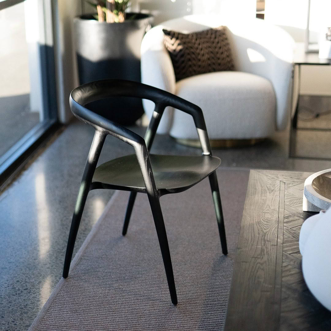 soho chair black Modern black chair in stylish living room setting