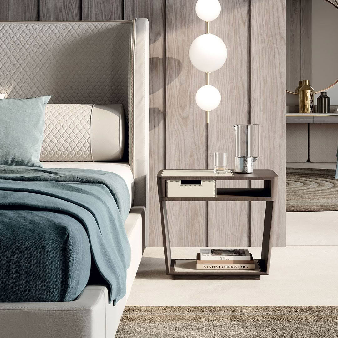 Elegant modern bedroom with stylish bedside table and lamp