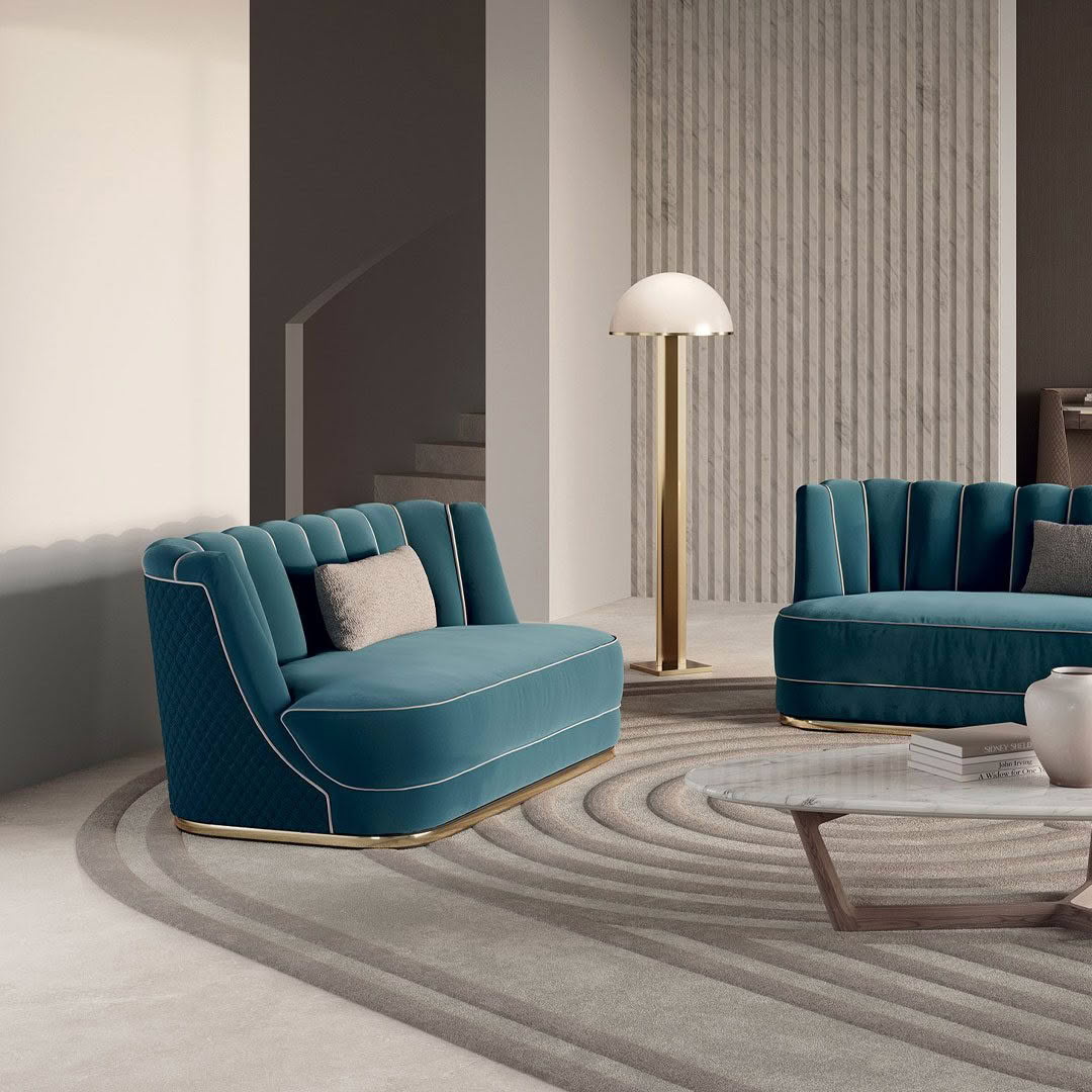 Elegant modern living room with teal sofas and lamp