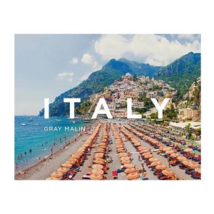 Colorful beach umbrellas in coastal Italian village