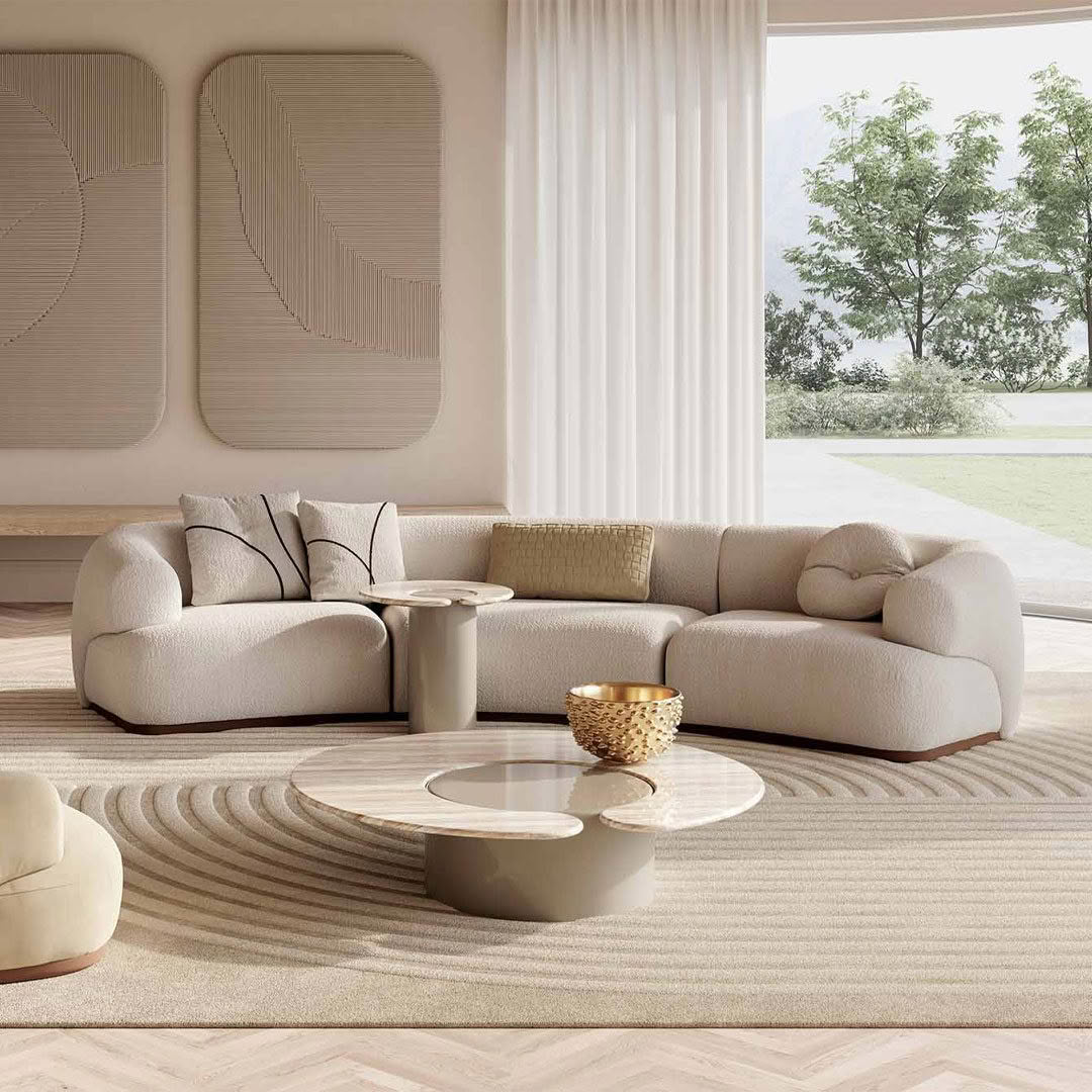 Modern living room with plush seating and large windows