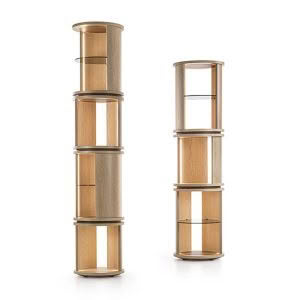 Two wooden cylindrical modern shelving units