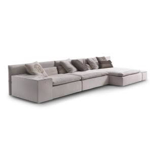 Modern light gray sectional sofa with cushions