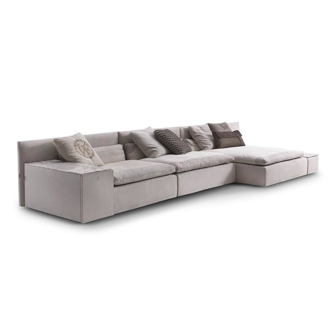 Modern light gray sectional sofa with cushions